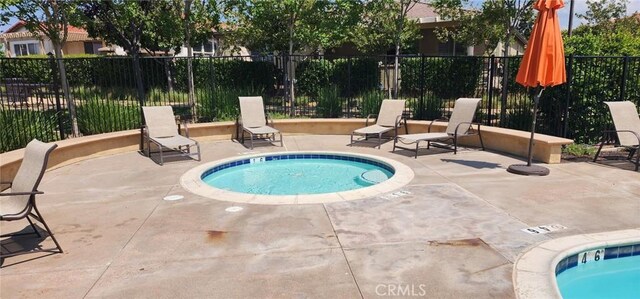 1334 Pinehurst Dr, Calimesa, CA 92320 - view of pool with a patio and a hot tub