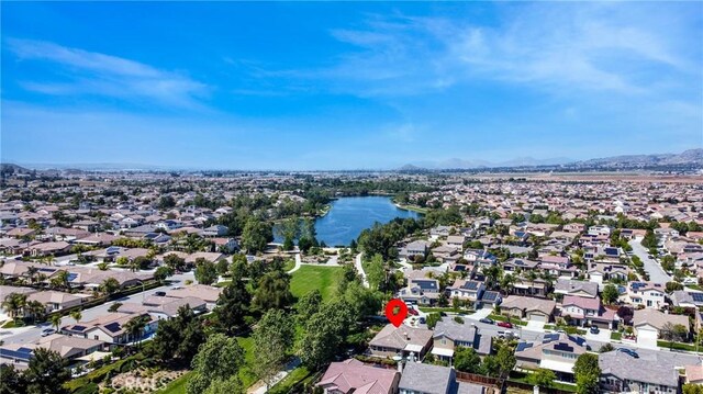 aerial view with a residential view and a water and mountain view