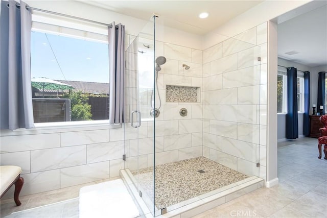 full bath with recessed lighting, tile patterned floors, a stall shower, and a wealth of natural light