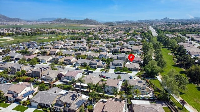 drone / aerial view with a residential view and a mountain view