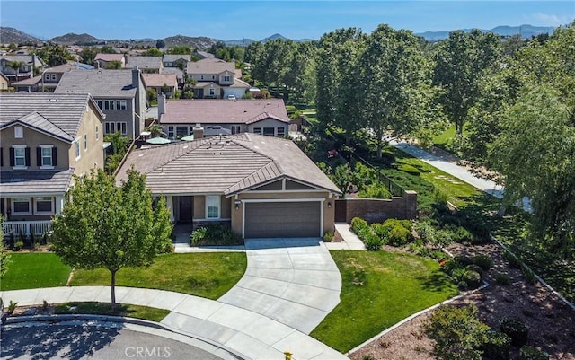 birds eye view of property featuring a mountain view and a residential view
