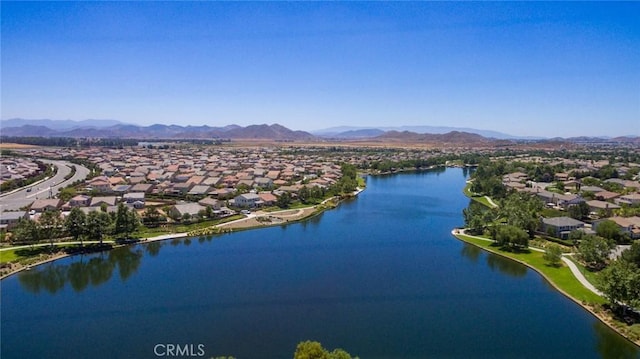 bird's eye view featuring a water and mountain view and a residential view