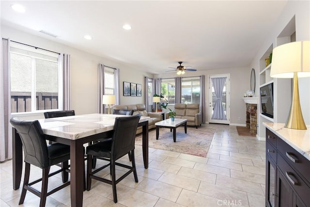 dining space featuring ceiling fan, visible vents, light tile patterned floors, baseboards, and recessed lighting