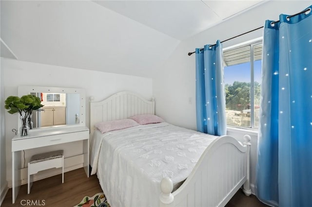 318 E 11th St, Pomona, CA 91766 - bedroom featuring lofted ceiling and dark wood-style flooring