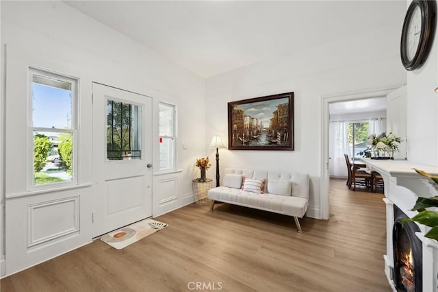 318 E 11th St, Pomona, CA 91766 - entryway with wood finished floors and baseboards