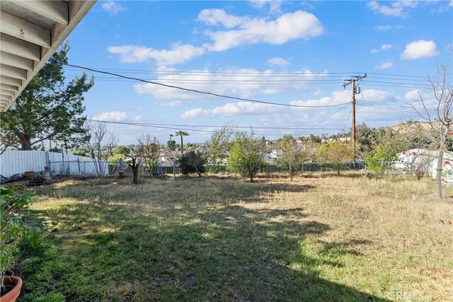 view of yard with fence