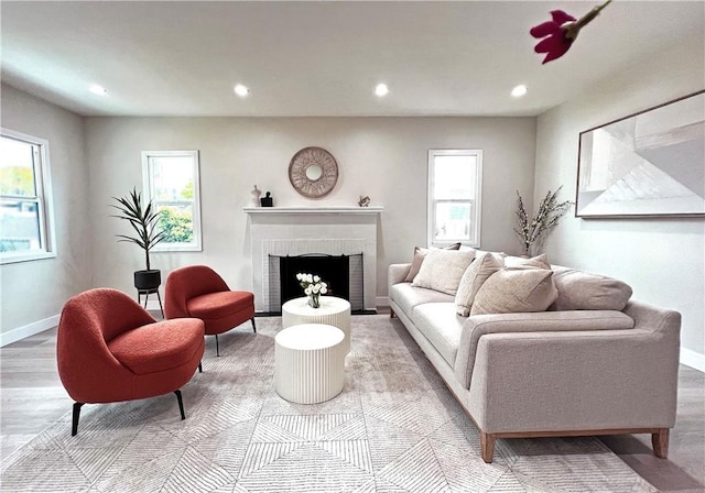 834 Morada Pl, Altadena, CA 91001 - living room with baseboards, wood finished floors, a brick fireplace, and recessed lighting