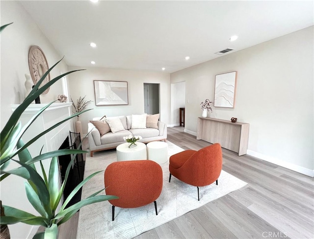 834 Morada Pl, Altadena, CA 91001 - living room with recessed lighting, visible vents, light wood finished floors, and baseboards