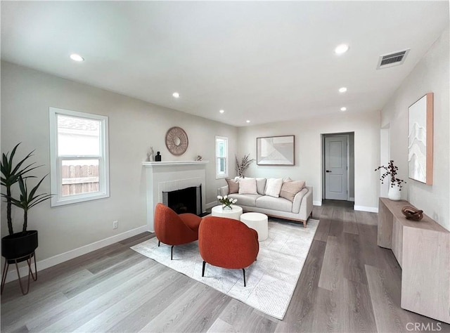 834 Morada Pl, Altadena, CA 91001 - living area featuring baseboards, visible vents, recessed lighting, wood finished floors, and a fireplace