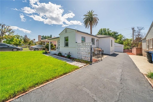 834 Morada Pl, Altadena, CA 91001 - single story home with stucco siding, a front lawn, fence, and a garage