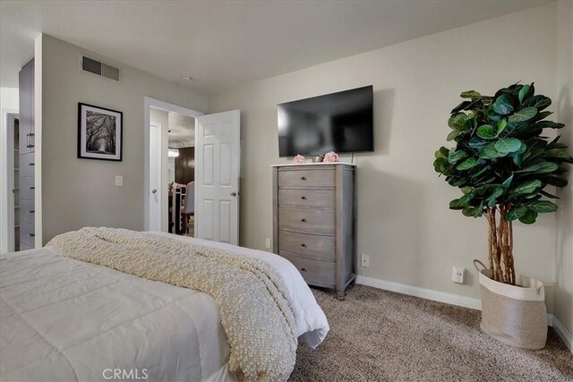 2800 Keller Dr Unit 285, Tustin, CA 92782 - bedroom featuring visible vents, carpet flooring, and baseboards