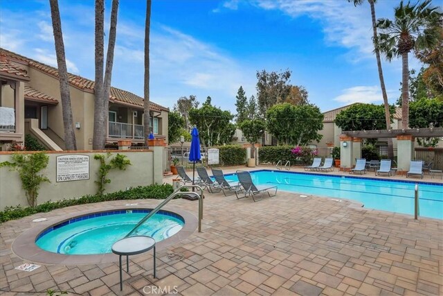 2800 Keller Dr Unit 285, Tustin, CA 92782 - community pool with fence, a pergola, a hot tub, and a patio