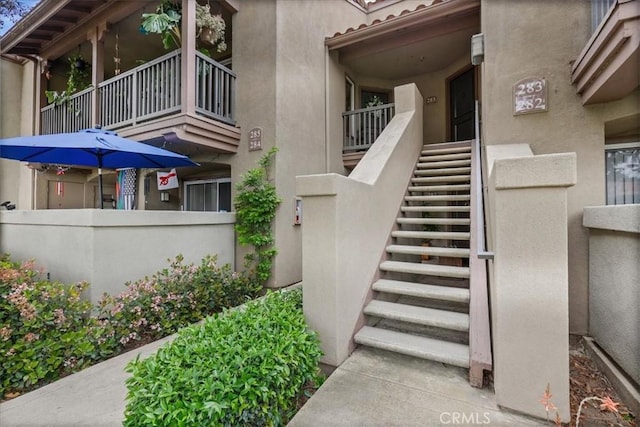 2800 Keller Dr Unit 285, Tustin, CA 92782 - doorway to property with stucco siding and fence