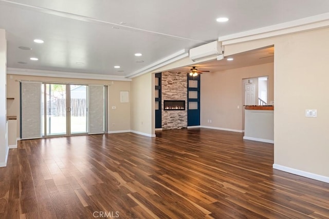 44863 Rein Ct, Temecula, CA 92592 - unfurnished living room with an AC wall unit, ceiling fan, dark wood-style flooring, a fireplace, and recessed lighting