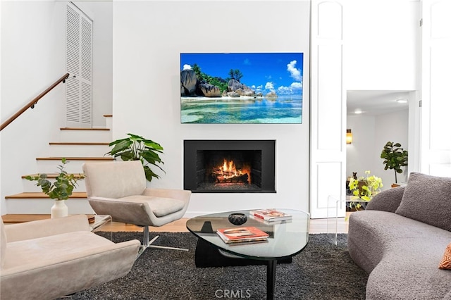 2402 Aspen Dr, Los Angeles, CA 90068 - living area featuring stairway and a lit fireplace
