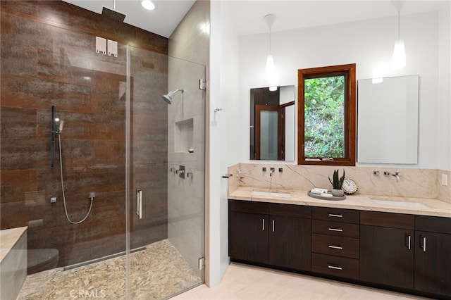 2402 Aspen Dr, Los Angeles, CA 90068 - full bath featuring double vanity, a shower stall, tasteful backsplash, and tile patterned floors
