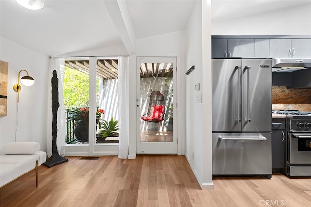 2402 Aspen Dr, Los Angeles, CA 90068 - interior space featuring light wood finished floors and vaulted ceiling