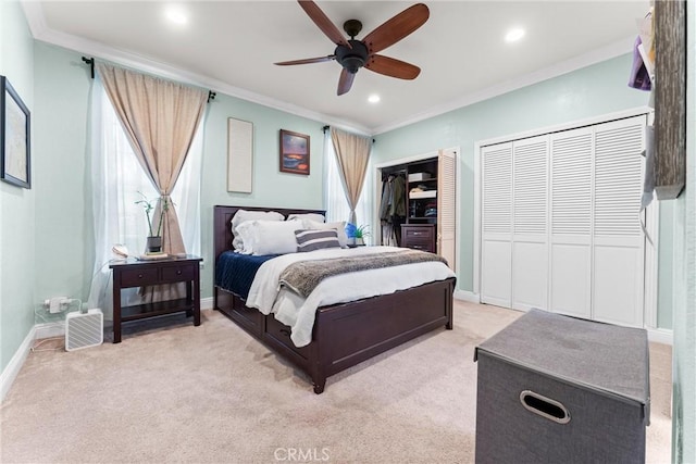 bedroom featuring two closets, ornamental molding, and light colored carpet