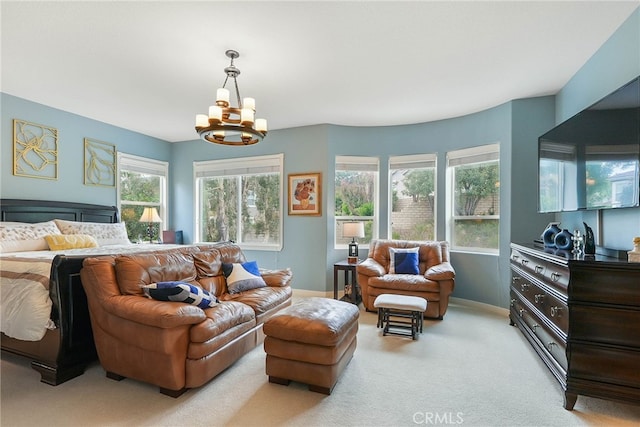 bedroom featuring baseboards, light carpet, and a notable chandelier