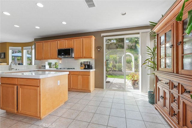 57 E Boulder Creek Rd, Simi Valley, CA 93065 - kitchen with visible vents, recessed lighting, light countertops, stainless steel microwave, and light tile patterned floors