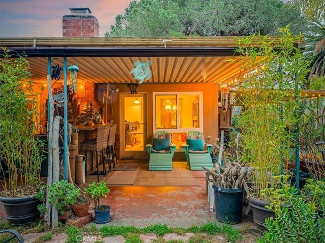 view of outbuilding with a porch