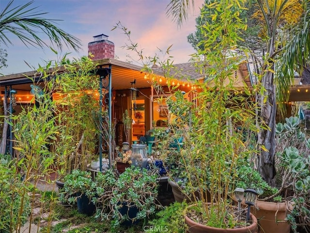 exterior space featuring a chimney