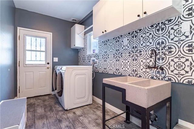 612 Newkirk Ave, Fullerton, CA 92832 - laundry room with baseboards, cabinet space, dark wood-style floors, and washer hookup