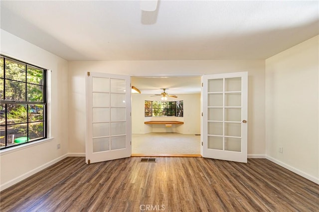 51192 Bon Veu Dr, Oakhurst, CA 93644 - spare room featuring wood finished floors, a ceiling fan, and french doors