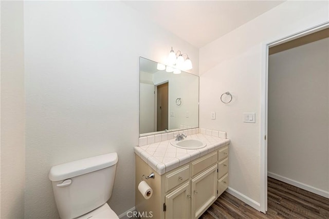 51192 Bon Veu Dr, Oakhurst, CA 93644 - half bathroom with wood finished floors and vanity