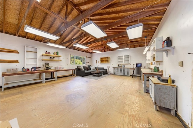 51192 Bon Veu Dr, Oakhurst, CA 93644 - miscellaneous room featuring a workshop area and lofted ceiling