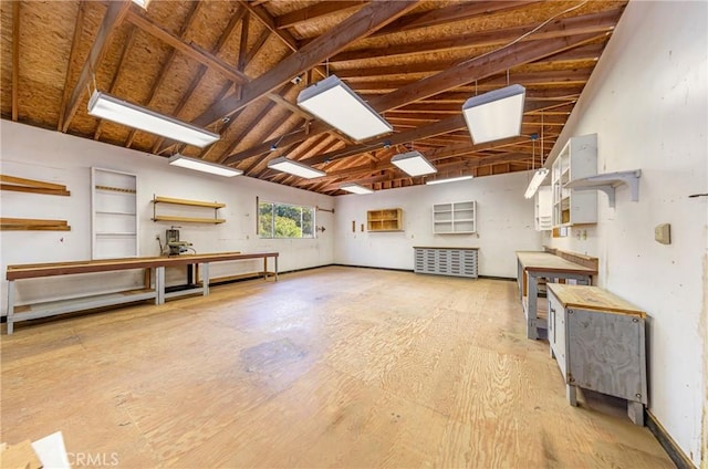 51192 Bon Veu Dr, Oakhurst, CA 93644 - misc room with vaulted ceiling and a workshop area