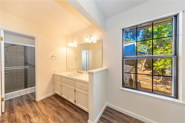 51192 Bon Veu Dr, Oakhurst, CA 93644 - bathroom with vanity, wood finished floors, and tiled shower