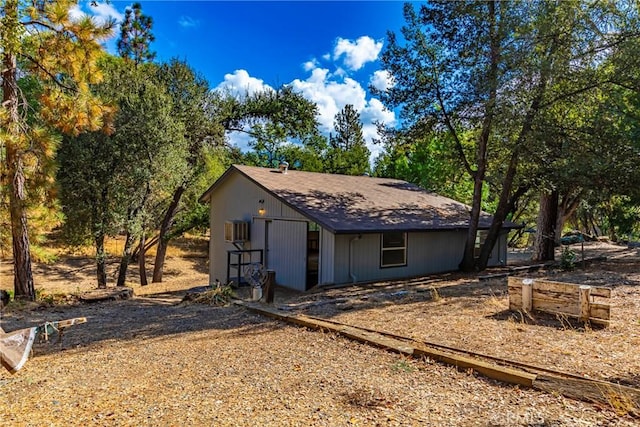 51192 Bon Veu Dr, Oakhurst, CA 93644 - view of outbuilding with view of wooded area