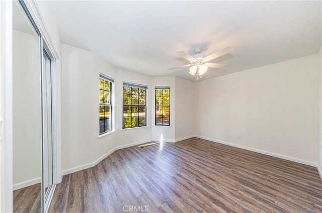 51192 Bon Veu Dr, Oakhurst, CA 93644 - empty room featuring wood finished floors and ceiling fan
