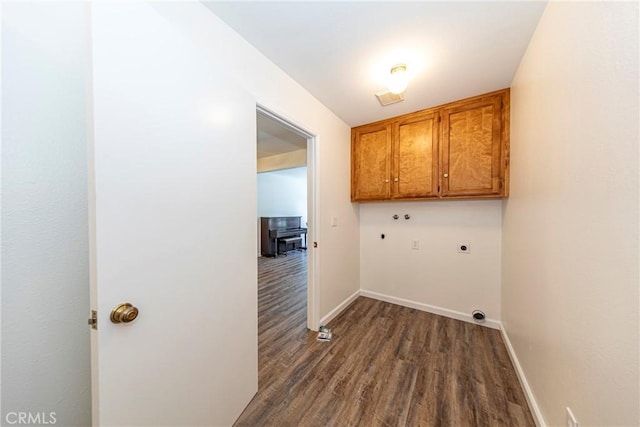 51192 Bon Veu Dr, Oakhurst, CA 93644 - washroom with hookup for an electric dryer, cabinet space, dark wood-style floors, washer hookup, and hookup for a gas dryer