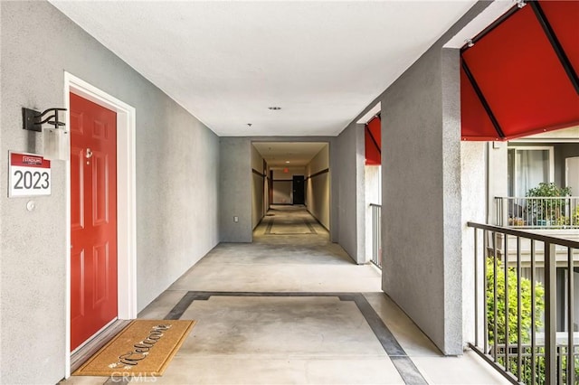 property entrance with a balcony