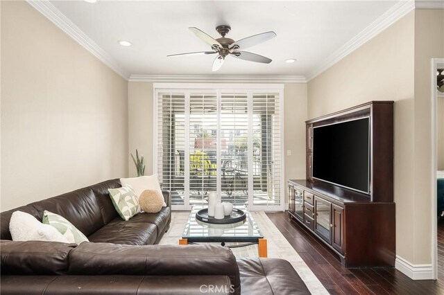 living room with a ceiling fan, dark wood-type flooring, ornamental molding, recessed lighting, and baseboards