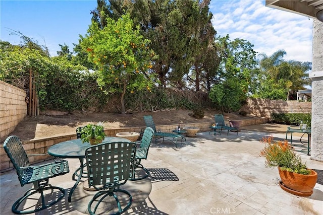 7701 Quimby Ave, West Hills, CA 91304 - fenced backyard with a patio and outdoor dining space