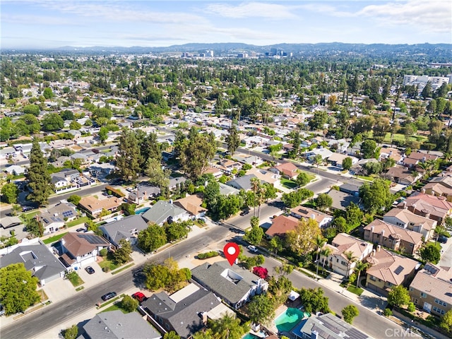 7701 Quimby Ave, West Hills, CA 91304 - aerial overview of property's location with mountains and nearby suburban area