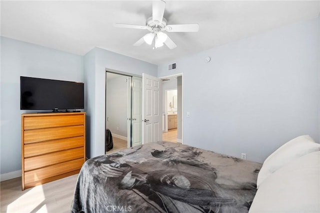 7701 Quimby Ave, West Hills, CA 91304 - bedroom with a closet, light wood-type flooring, and a ceiling fan