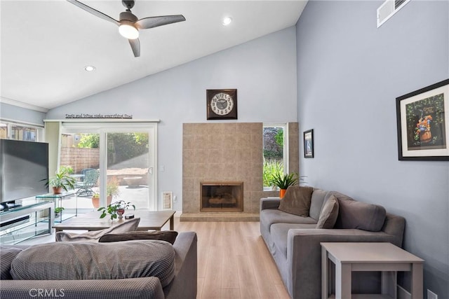 7701 Quimby Ave, West Hills, CA 91304 - living room featuring light wood-style flooring, plenty of natural light, high vaulted ceiling, recessed lighting, and a ceiling fan