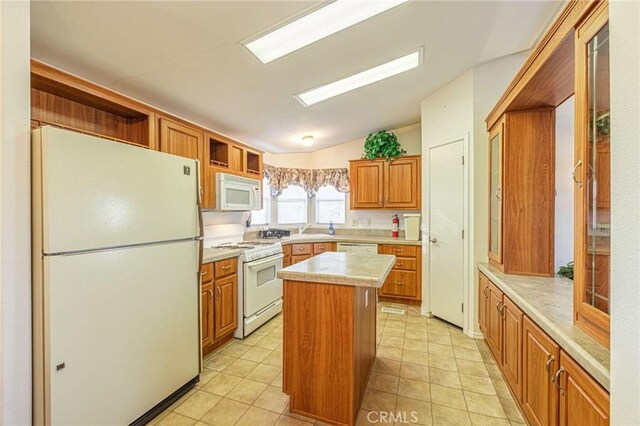 kitchen featuring vaulted ceiling, a center island, open shelves, white appliances, and light countertops