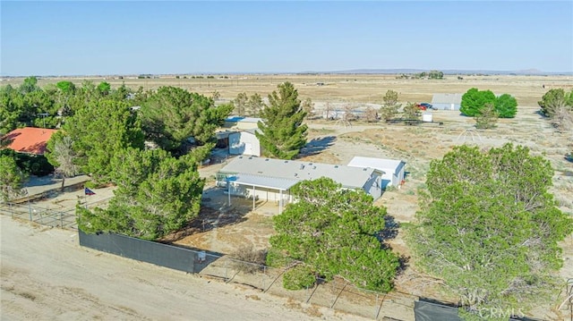 birds eye view of property featuring a rural view