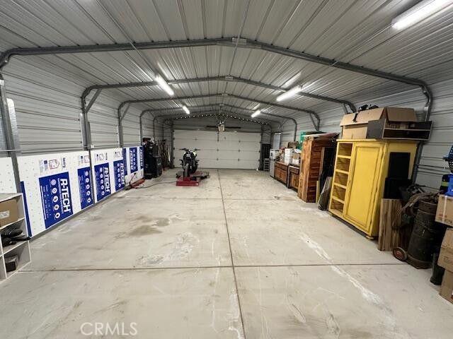 garage featuring metal wall