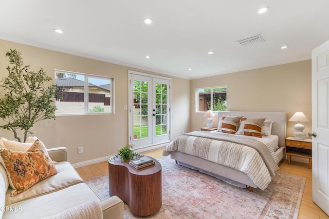 4806 Glenwood Ave, La Crescenta, CA 91214 - bedroom featuring ornamental molding, light wood-type flooring, recessed lighting, baseboards, and french doors
