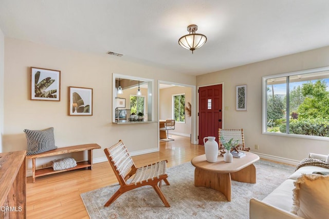 4806 Glenwood Ave, La Crescenta, CA 91214 - living area featuring light wood-style flooring and baseboards