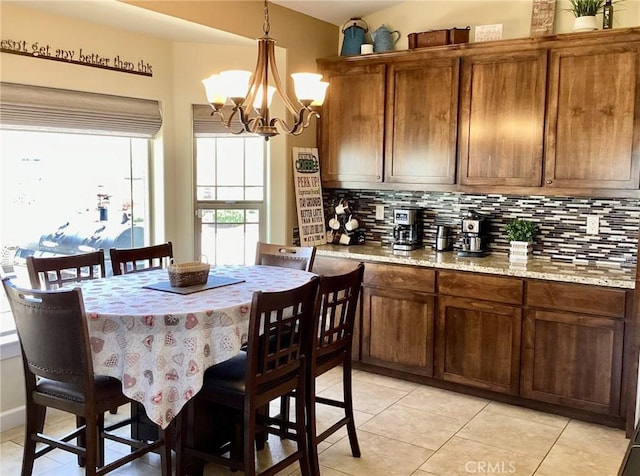 77011 Douglas Rd, San Miguel, CA 93451 - dining area with a chandelier and light tile patterned flooring