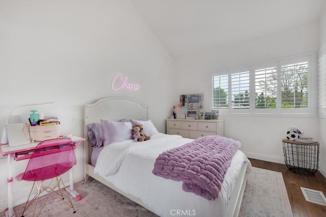 22724 Califa St, Woodland Hills, CA 91367 - bedroom featuring lofted ceiling, wood finished floors, and baseboards
