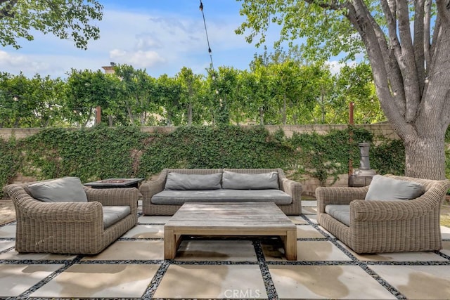 22724 Califa St, Woodland Hills, CA 91367 - fenced backyard with outdoor lounge area and a patio area