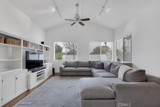 22724 Califa St, Woodland Hills, CA 91367 - living room with track lighting, dark wood-type flooring, a ceiling fan, and high vaulted ceiling